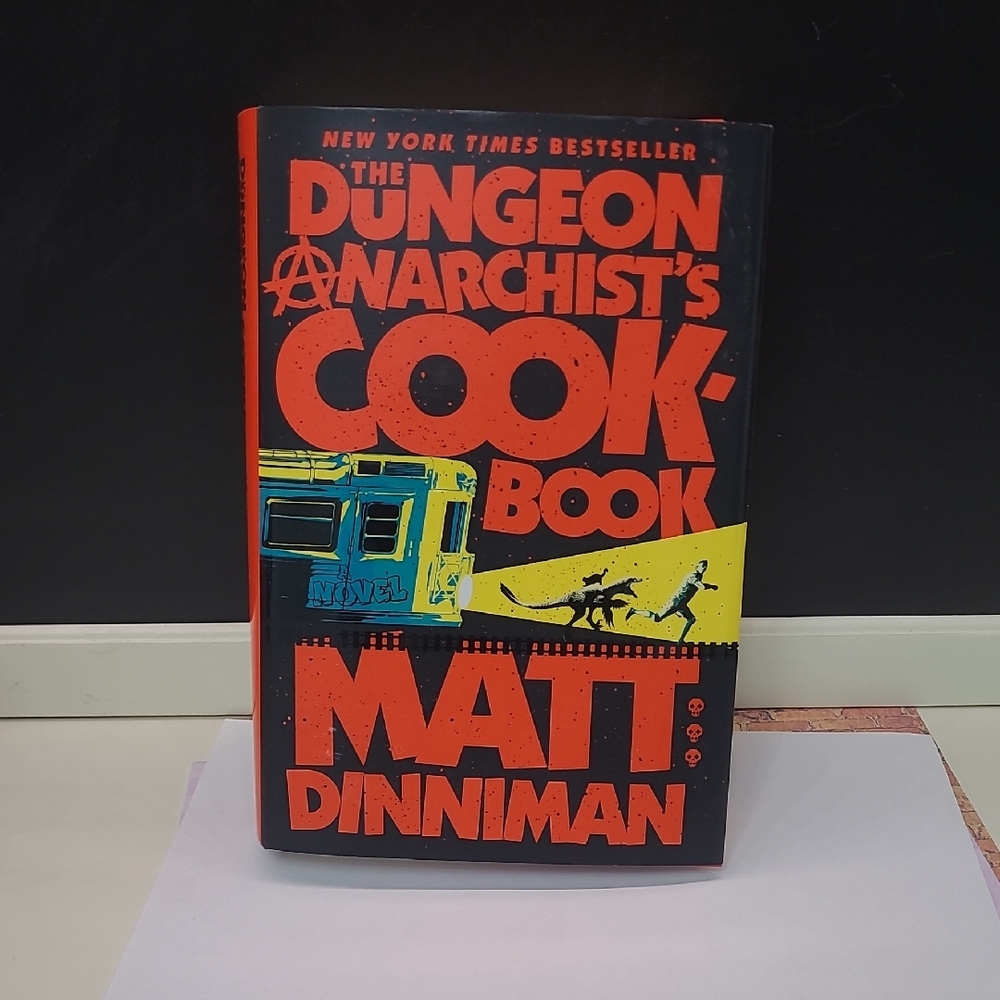 2 Hardcover Books- The Dungeon Anarchist's Cook Book And Eye Of The Bedlam Bride